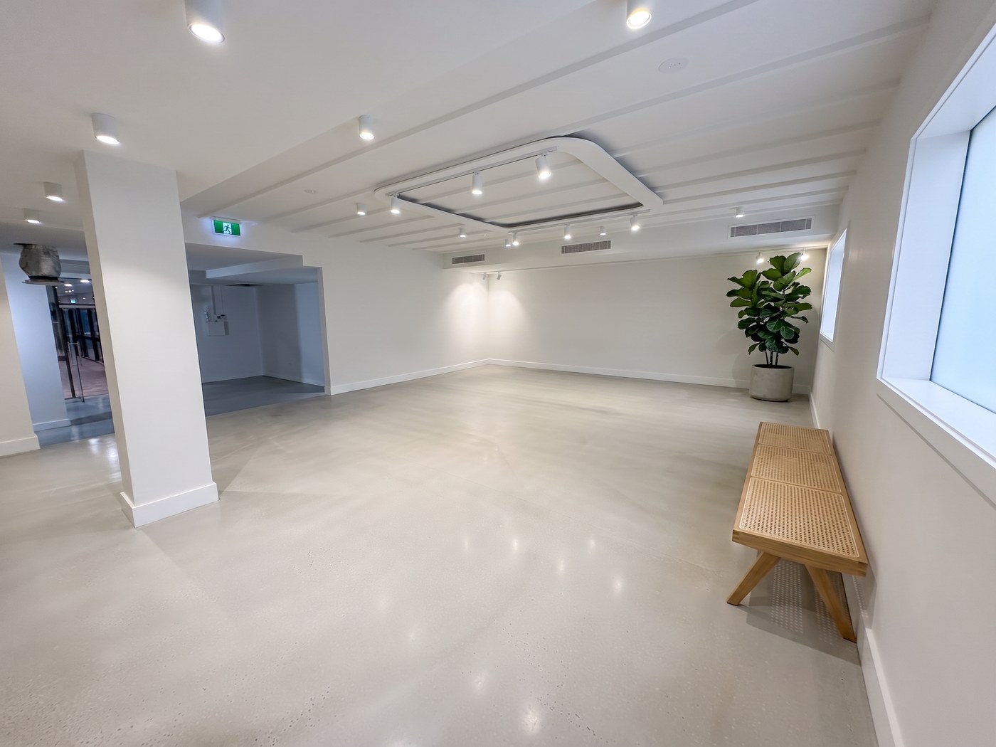 Decorative concrete overlay, burnished seamless finish in a studio space