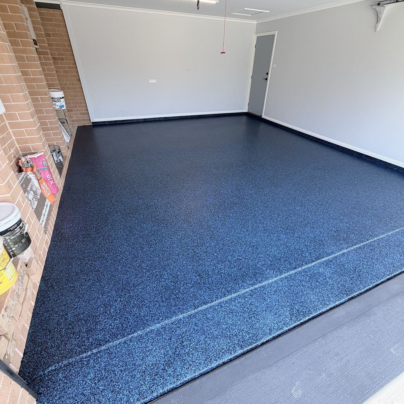 Blue flake epoxy garage floor